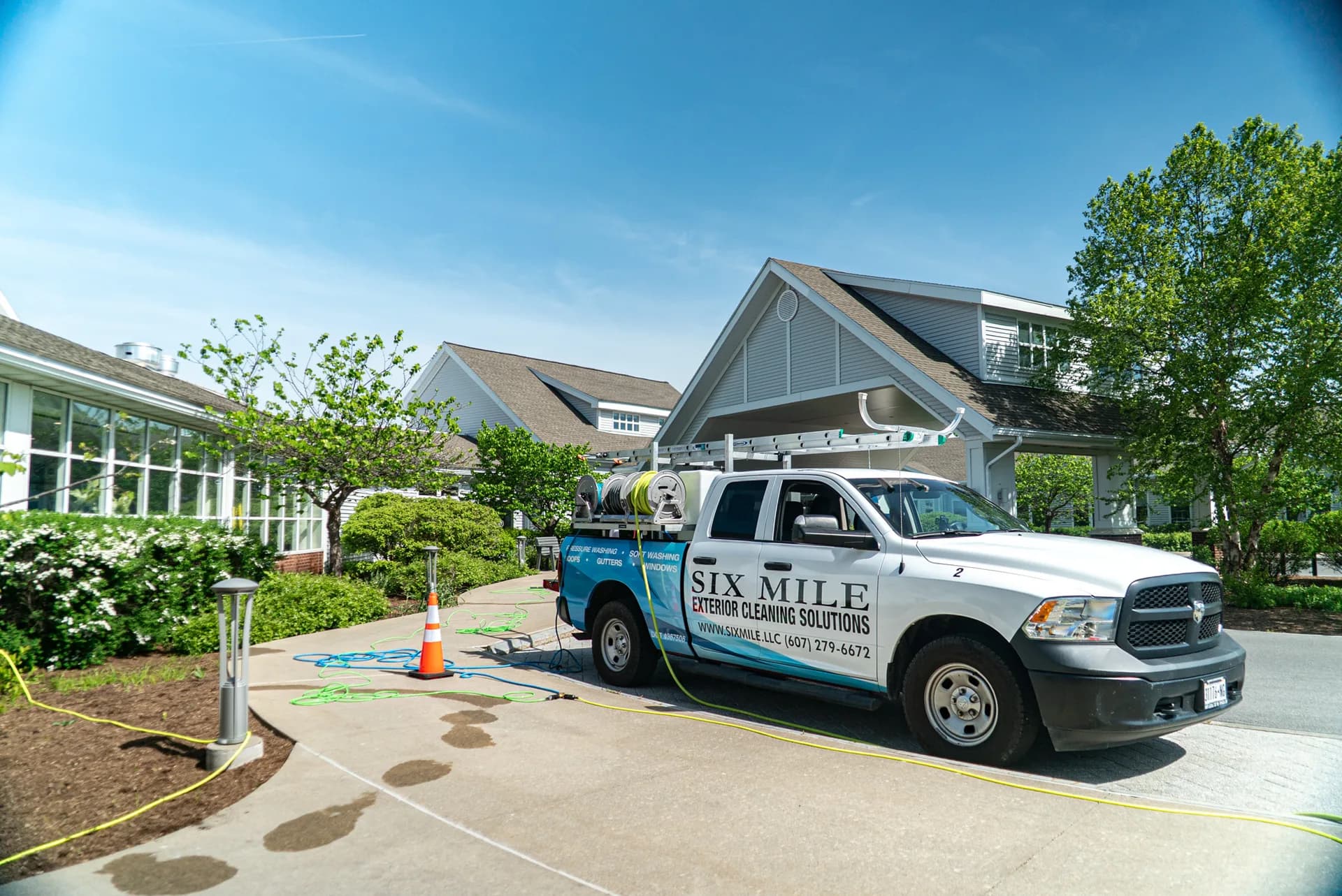 Six Mile professional cleaning truck serving residential neighborhood