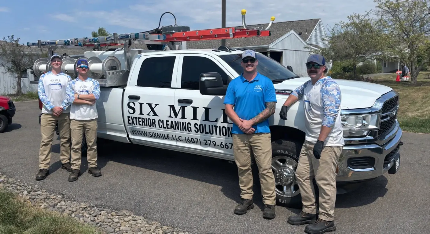 The Six Mile crew loading equipment before a job